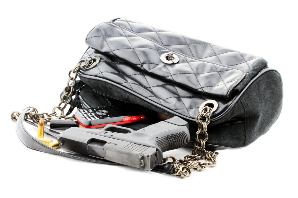 Purse with handgun and other accessories