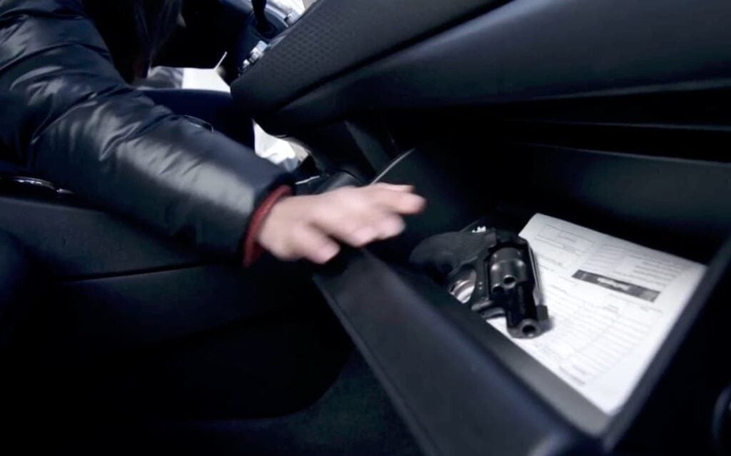 Concealed Carry handgun in a glove compartment