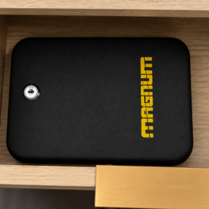 Magnum Key-Lock Security Case on a Nightstand Drawer